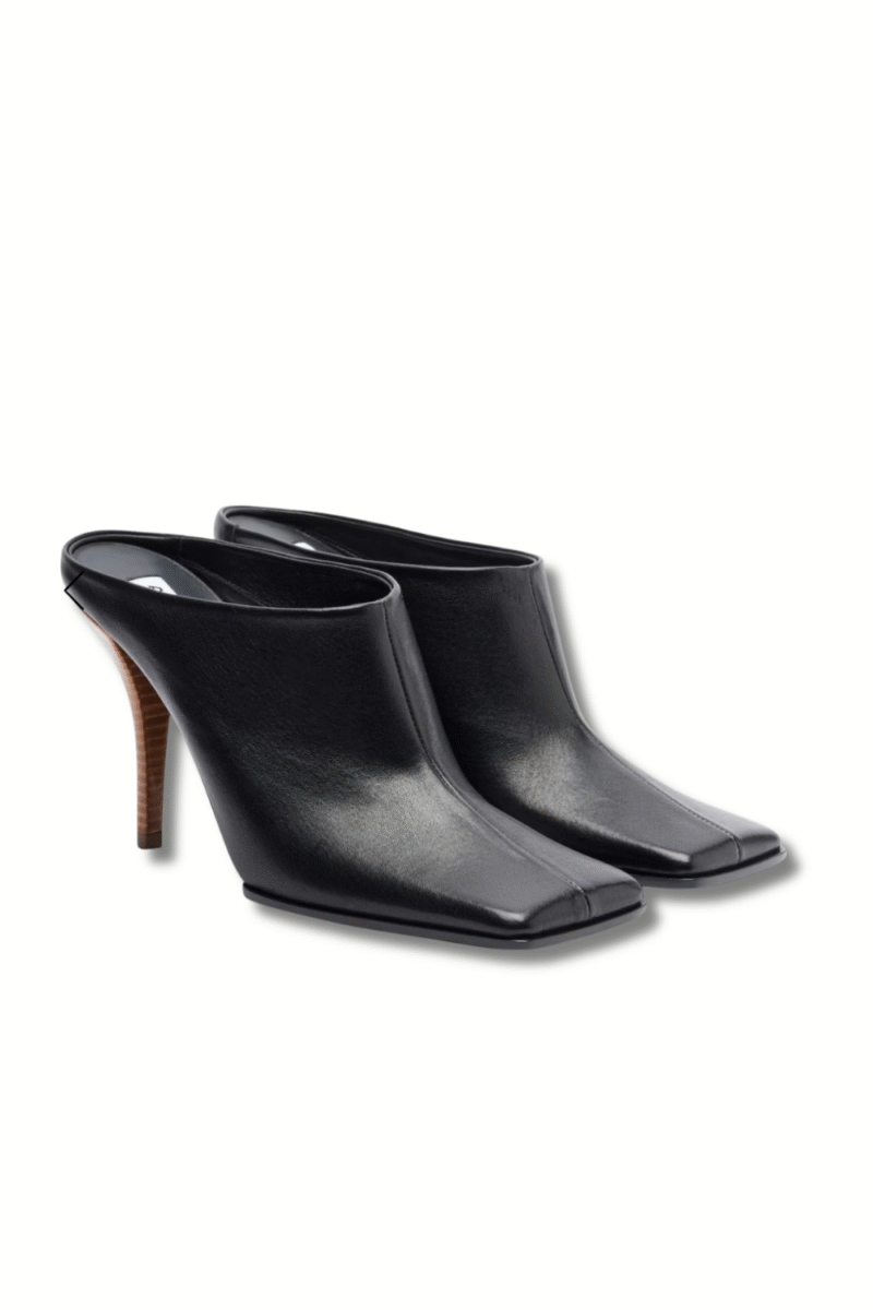 Mules noires Alaïa élégantes pour look chic femme et tenue de bureau sophistiquée